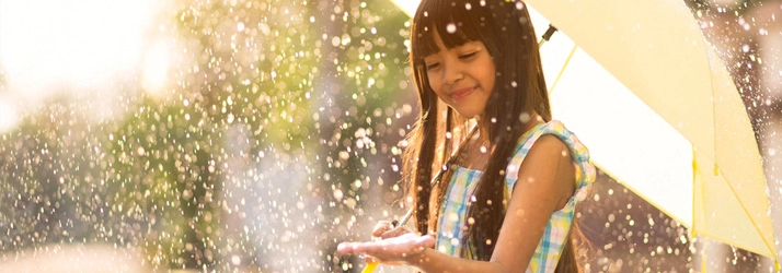 Chiropractic American Fork UT Child Pain Free Girl In Rain With Umbrella