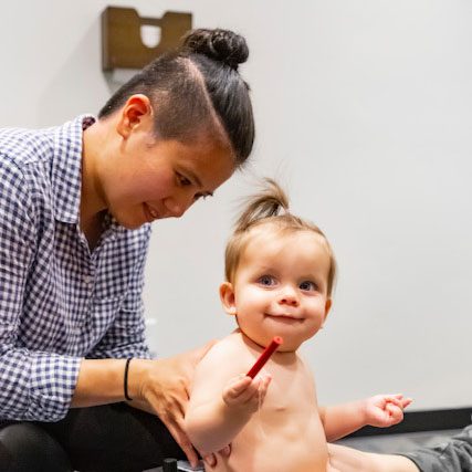 Chiropractor American Fork UT Dr Debbie Pun with Pediatric Patient